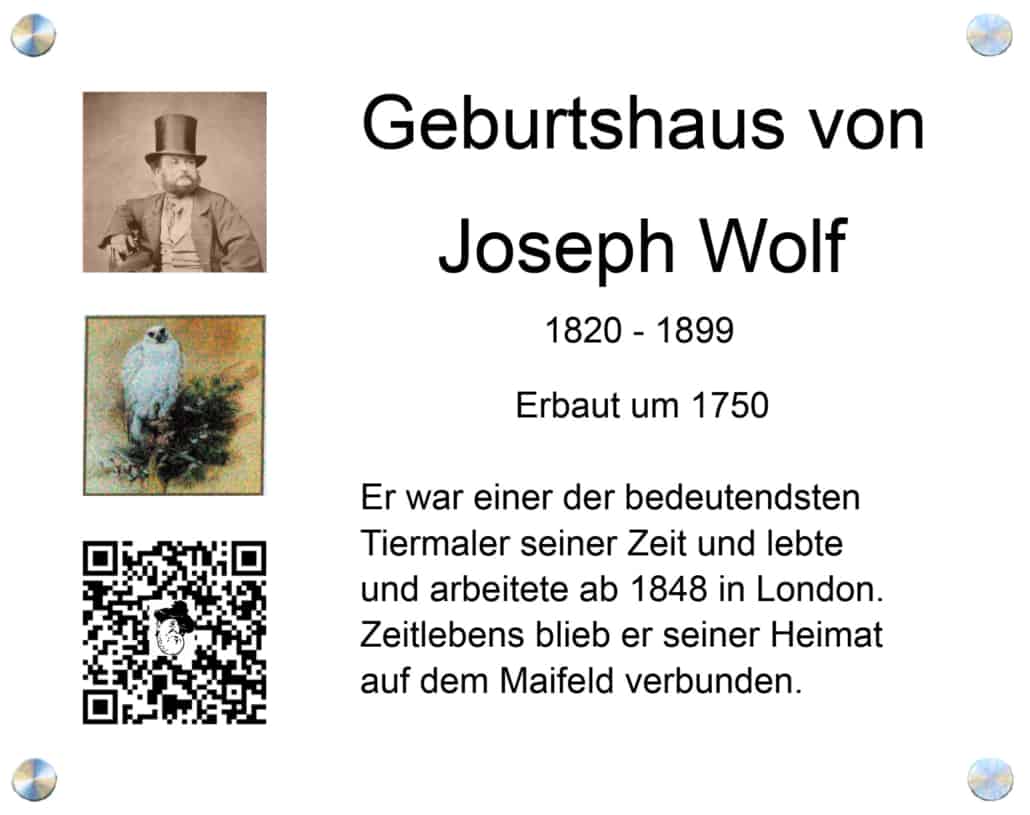Plakette am Geburtshaus des Tiermalers Josef Wolf in Mörz